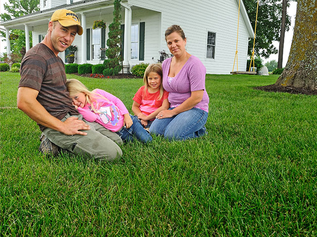 After enrolling in "Returning to the Farm," Garrett Riekhof was confident he could earn enough income farming to support his wife, Cara, and daughters Makenna and Annika. (Progressive Farmer photo by Jim Patrico)